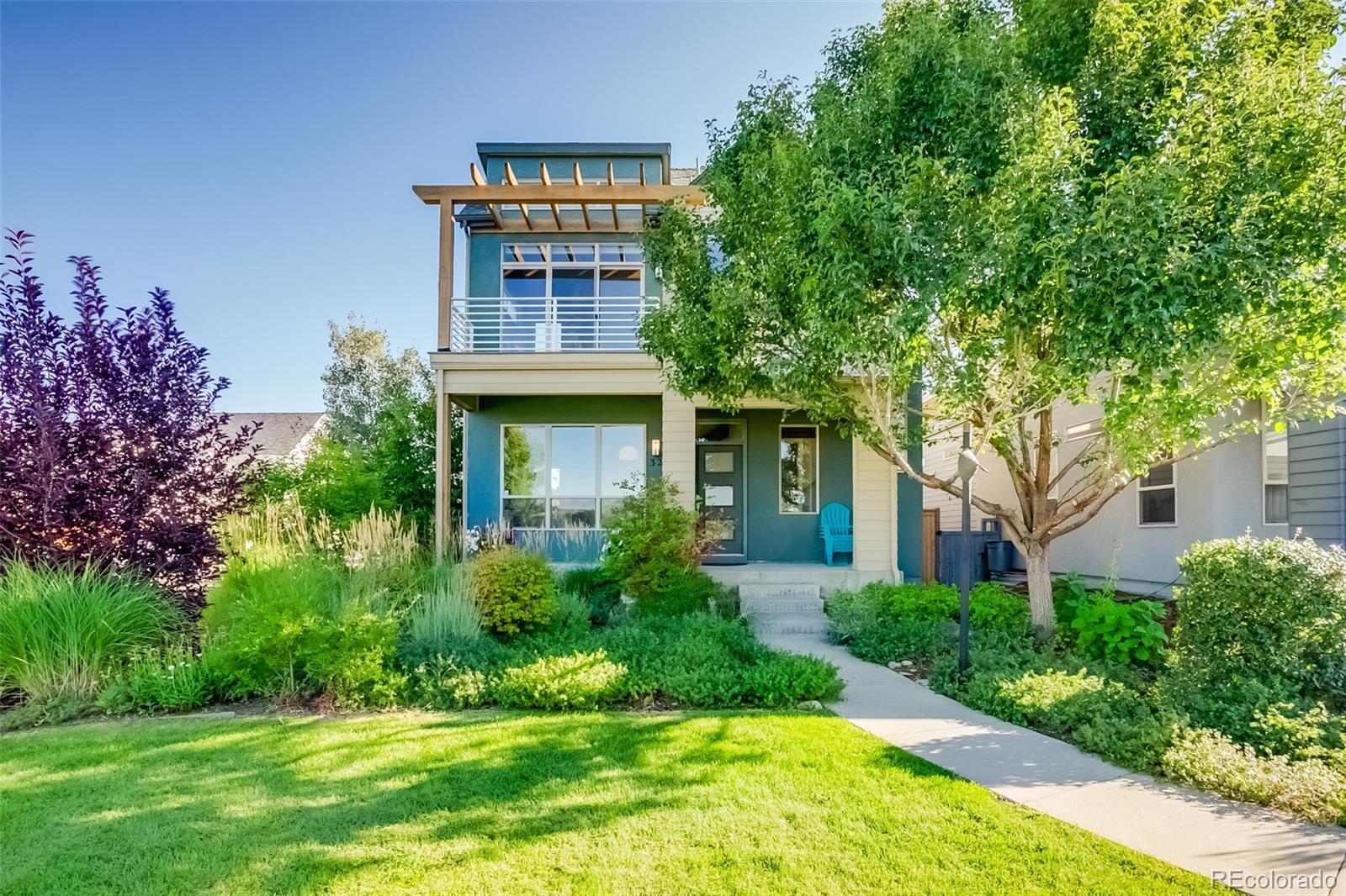 3219 Spruce Street Denver, CO 80238 - Photo 1 of 50 a house view with a garden space