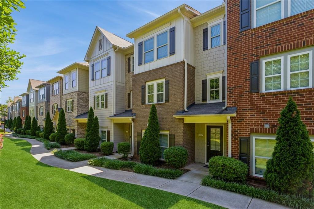 3056 Turman Circle Decatur, GA 30033 - Photo 1 of 1 a front view of a residential apartment building with a yard