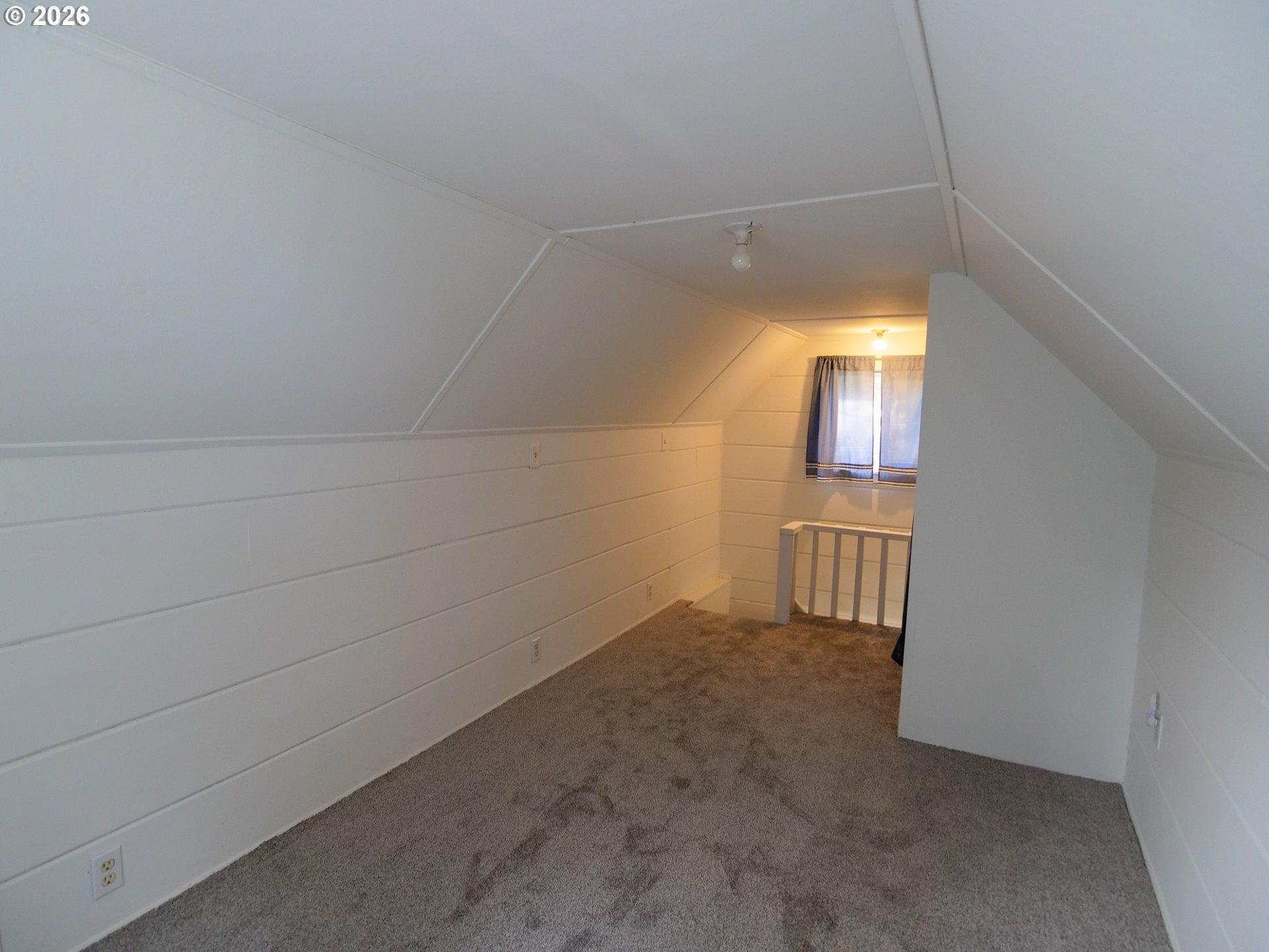 69947 East E Highway, Unit 1 Rhododendron, OR 97049 - Photo 10 of 25 a view of a room with an empty space and a window