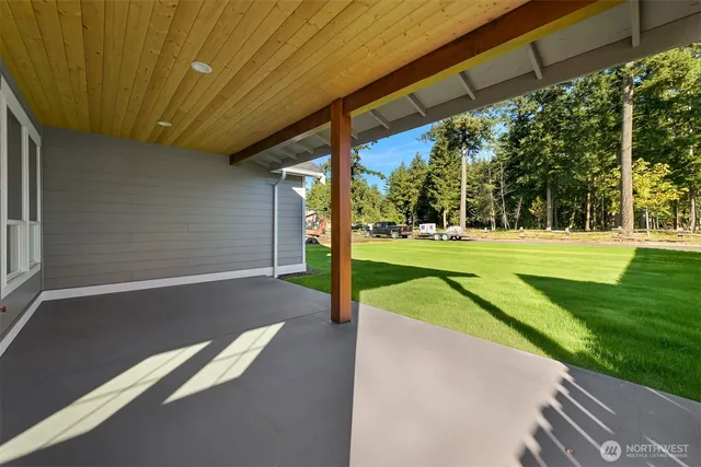 a view of a house with a big yard