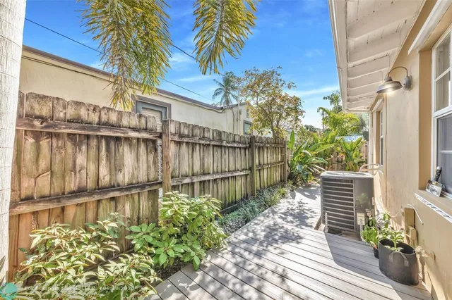 a garden view with a fountain