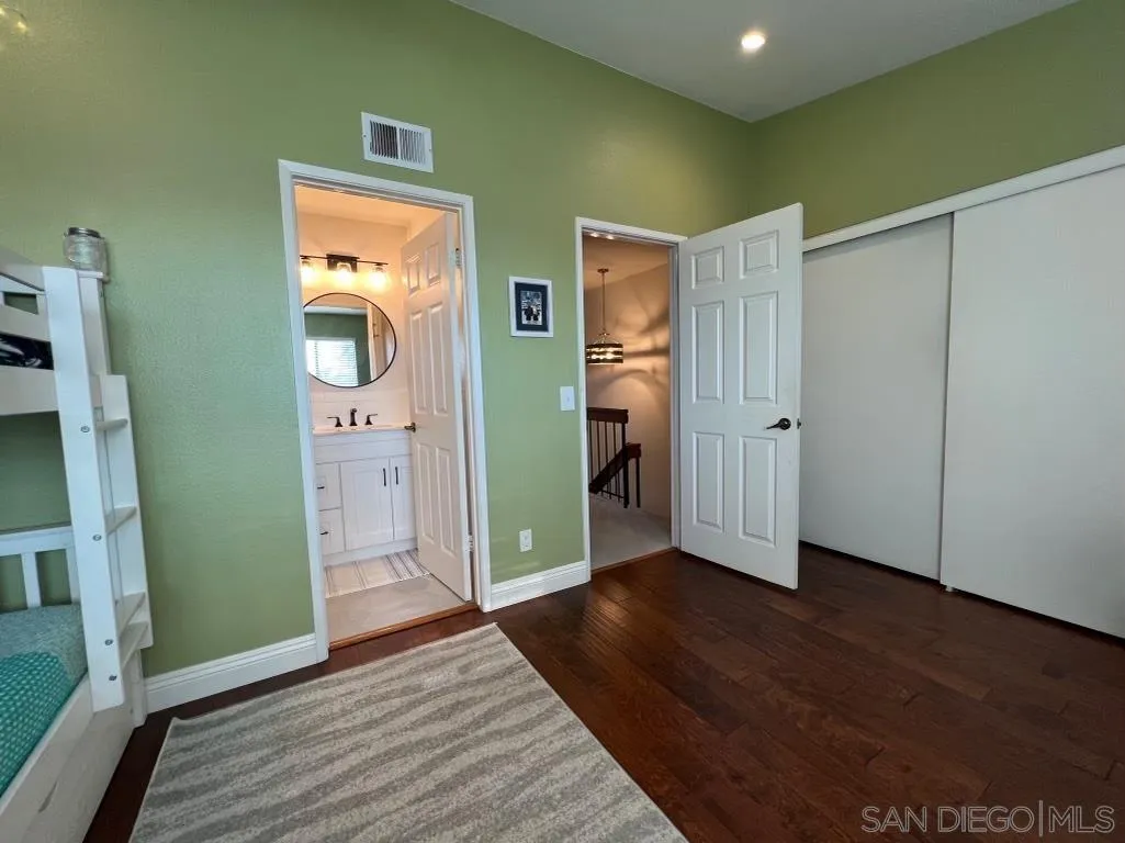 6805 Maple Leaf Drive Carlsbad, CA 92011 - Photo 13 of 22 a view of entryway with wooden floor