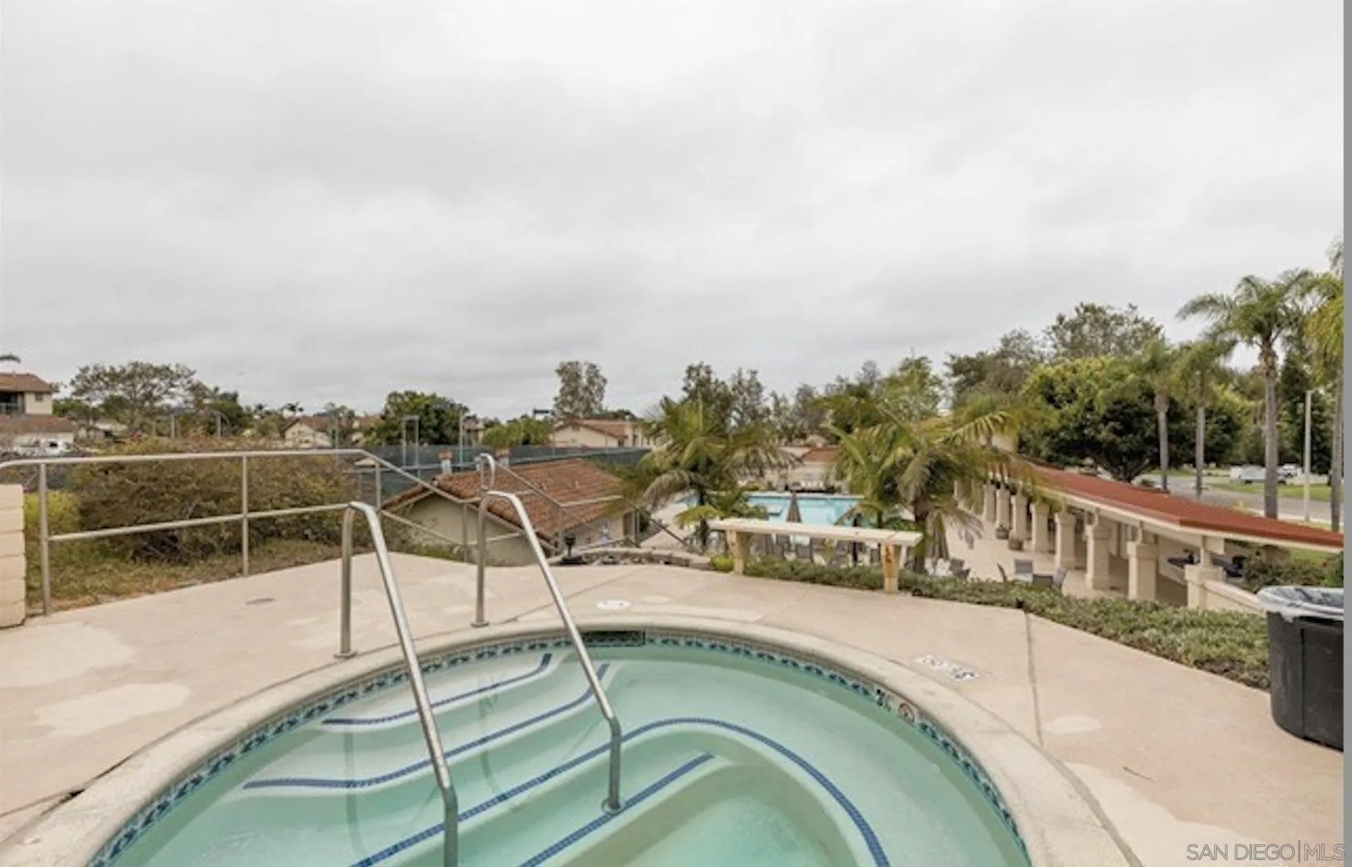 6805 Maple Leaf Drive Carlsbad, CA 92011 - Photo 20 of 22 a view of a swimming pool with an outdoor seating