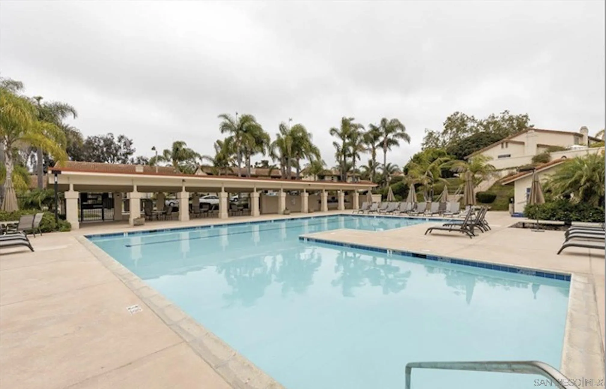 6805 Maple Leaf Drive Carlsbad, CA 92011 - Photo 21 of 22 a view of a swimming pool with outdoor seating