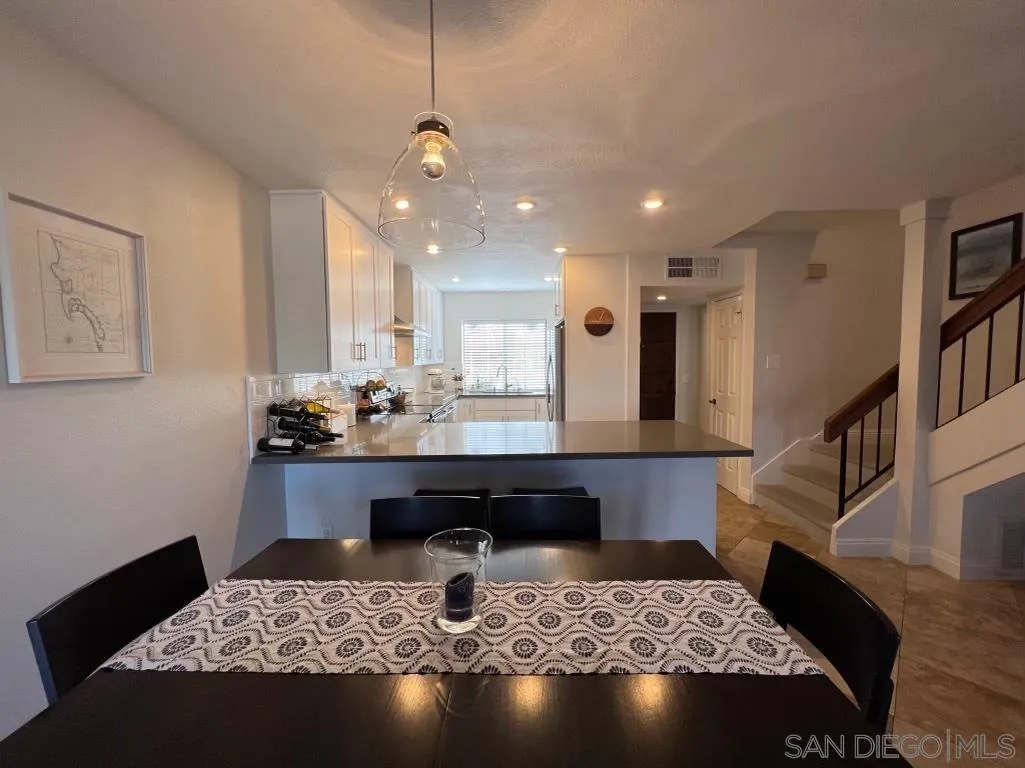 6805 Maple Leaf Drive Carlsbad, CA 92011 - Photo 7 of 22 a living room with a couch