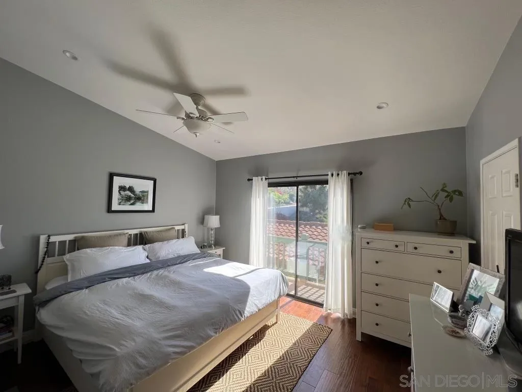 6805 Maple Leaf Drive Carlsbad, CA 92011 - Photo 10 of 22 a bedroom with a bed and a window
