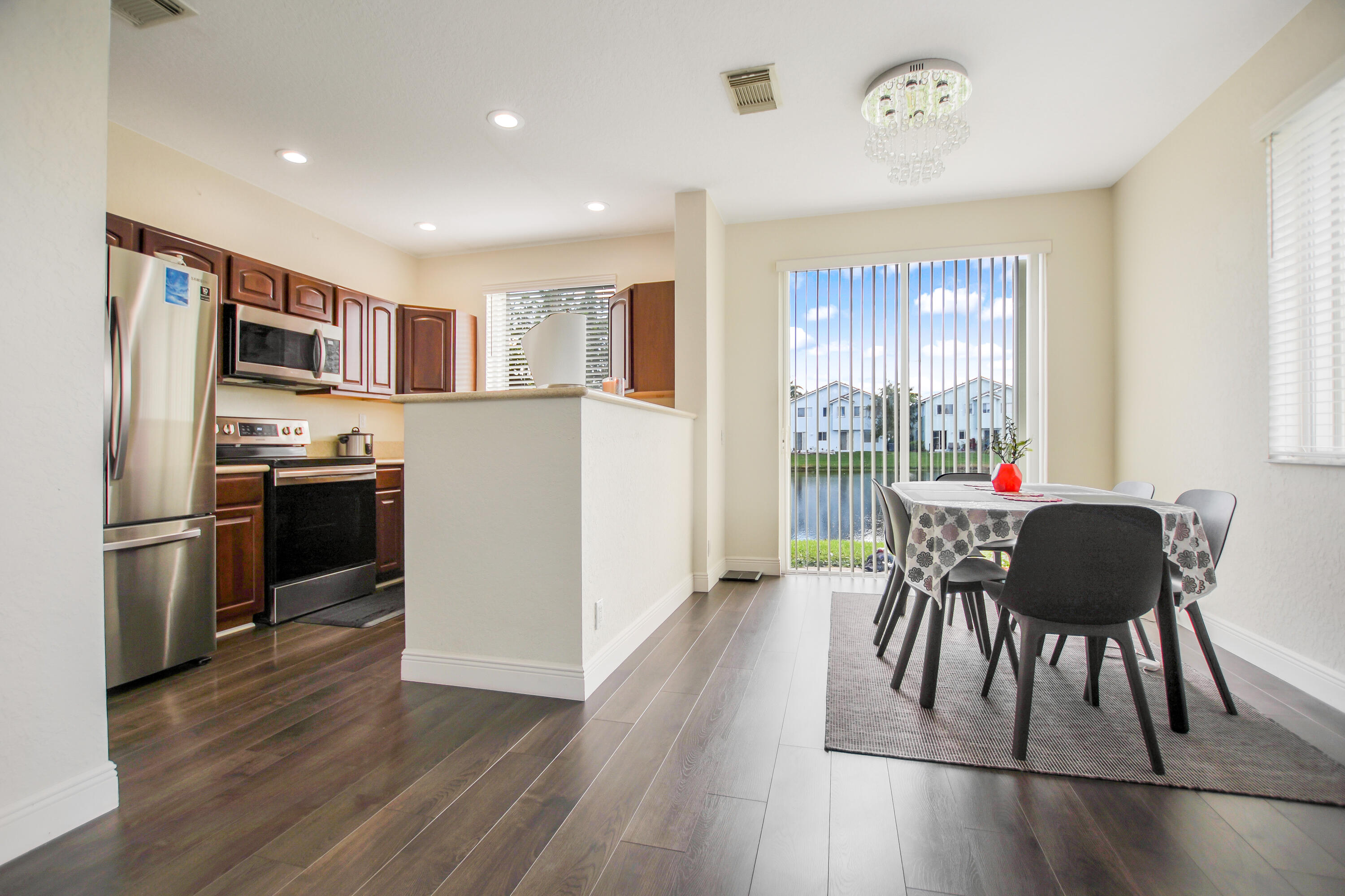 3268 Laurel Ridge Circle Riviera Beach, FL 33404 - Photo 1 of 33 Kitchen / Dining Room