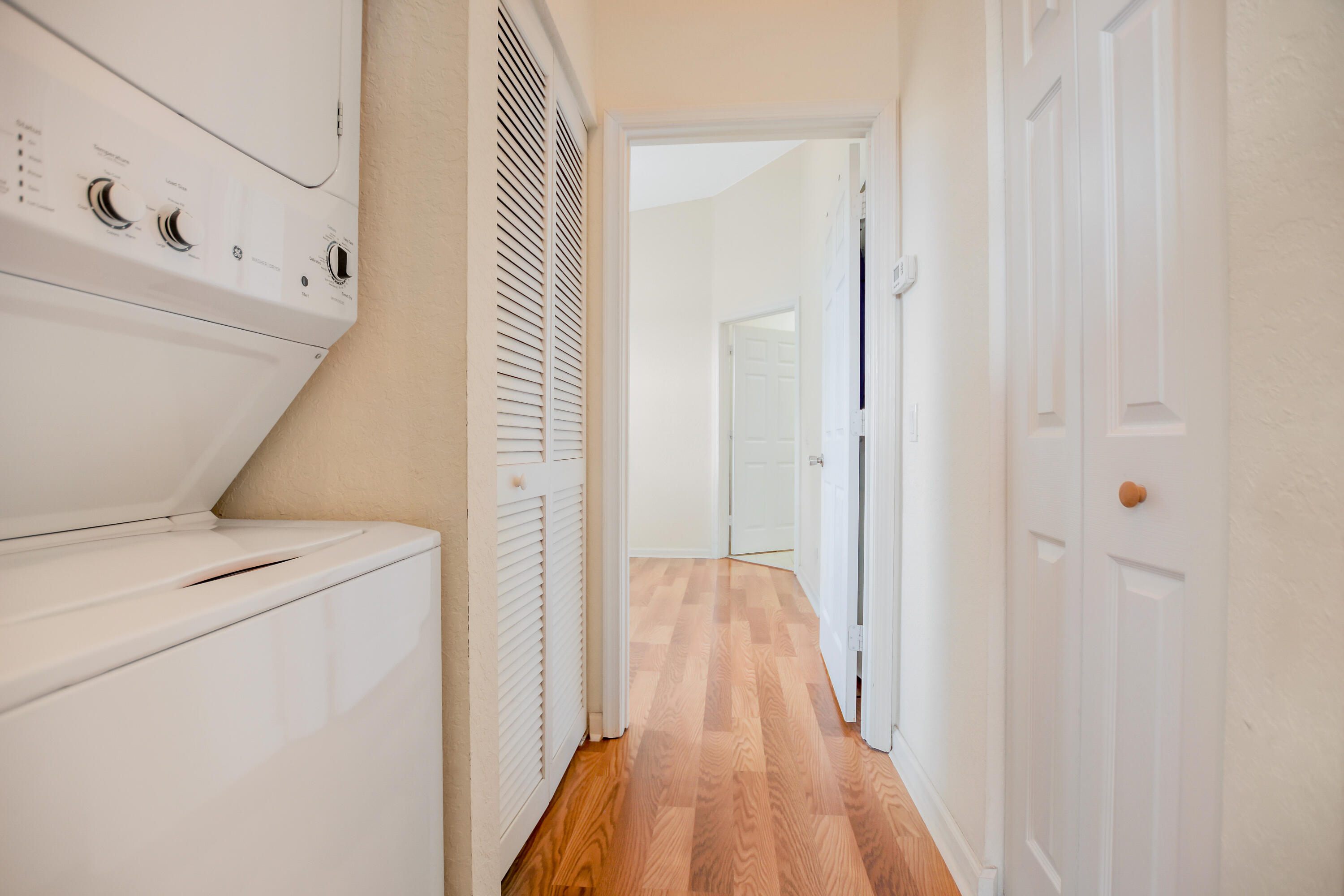 3268 Laurel Ridge Circle Riviera Beach, FL 33404 - Photo 15 of 33 Upstairs laundry / hallway