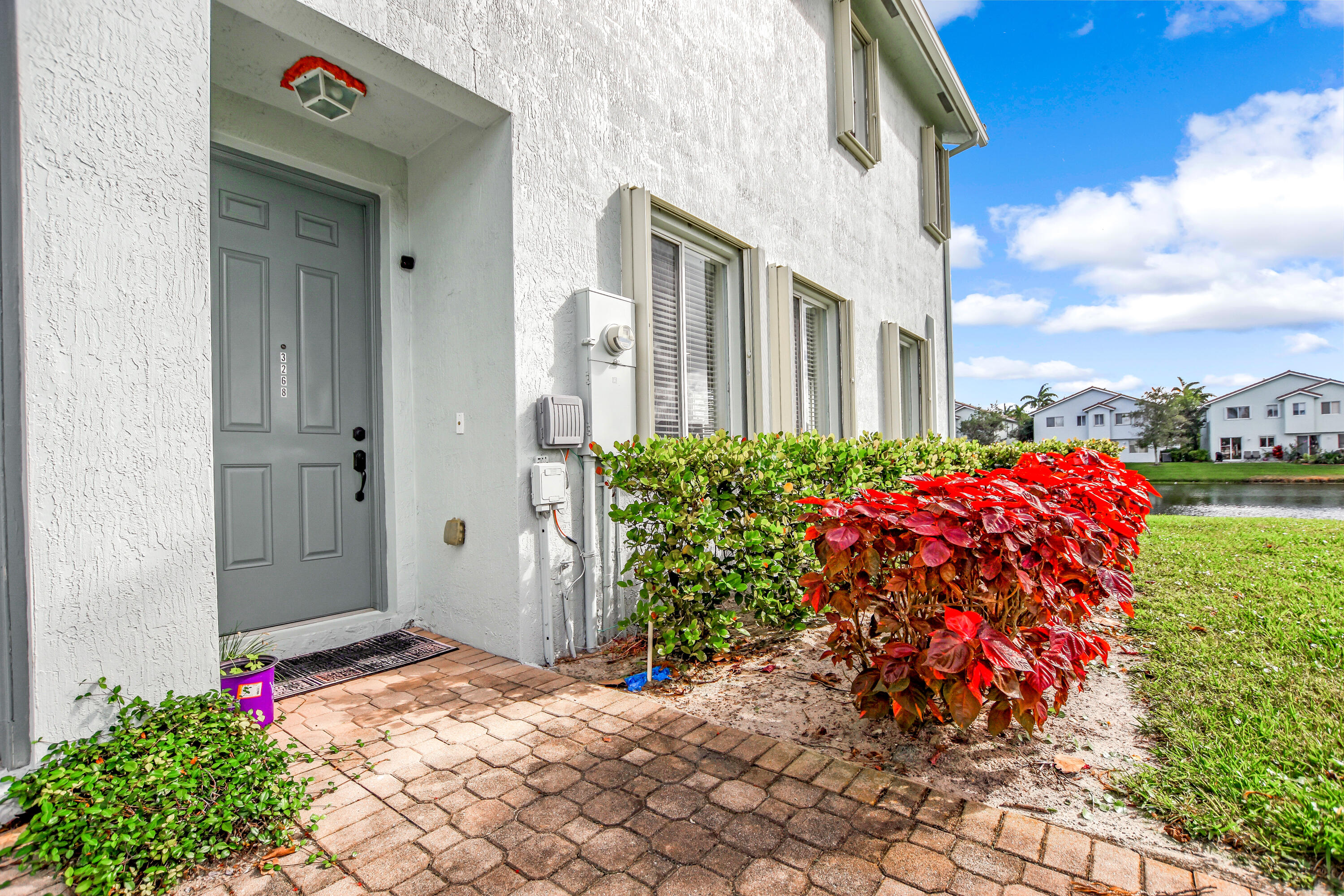 3268 Laurel Ridge Circle Riviera Beach, FL 33404 - Photo 21 of 33 Front Door
