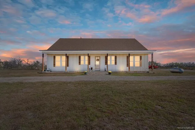 front view of house with a yard