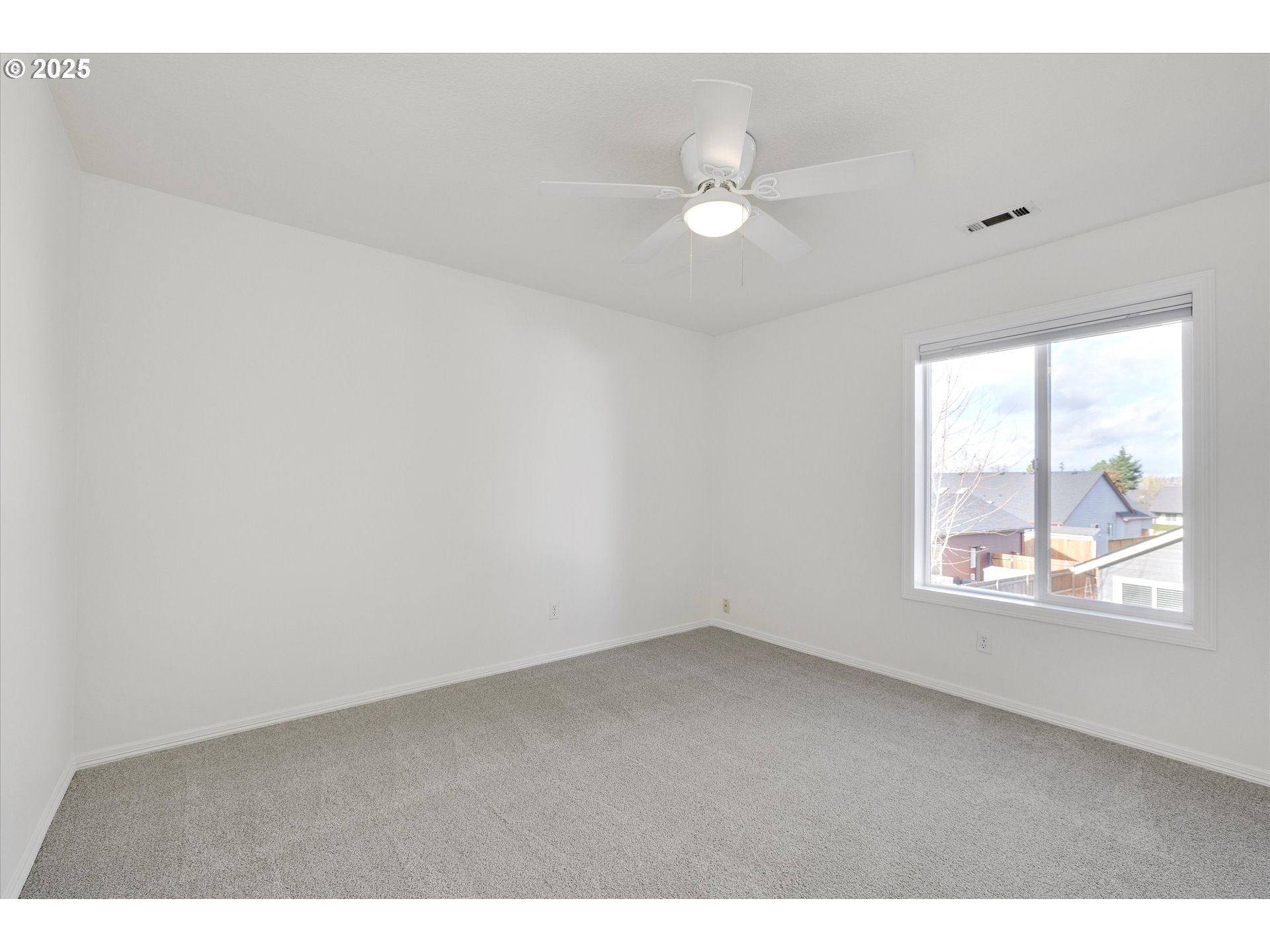 1380 Southeast 9th Avenue Canby, OR 97013 - Photo 16 of 21 a view of an empty room with a window