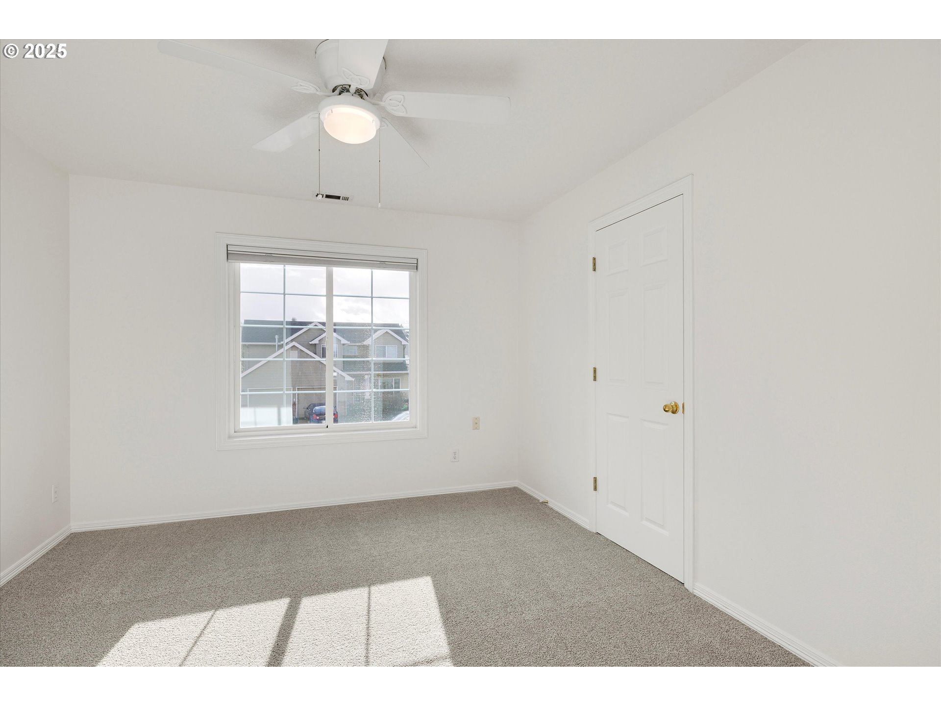 1380 Southeast 9th Avenue Canby, OR 97013 - Photo 18 of 21 a view of an empty room with a window