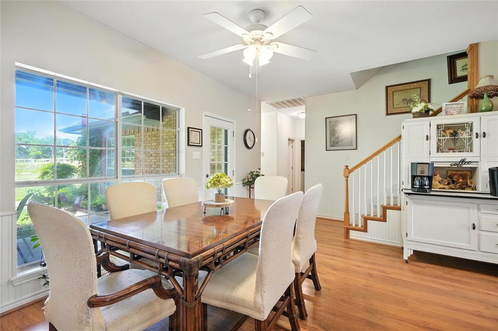 2134 Rains County Road 1402 Point, TX 75472 - Photo 6 of 26 a view of a dining room with furniture window and wooden floor