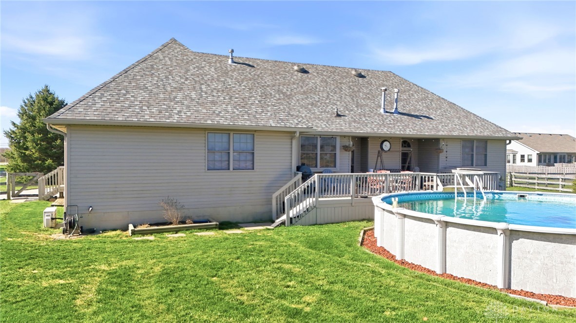 1540 Jasper Road Xenia, OH 45385 - Photo 7 of 91 This residence features a pool and a generous yard, ideal for outdoor leisure.