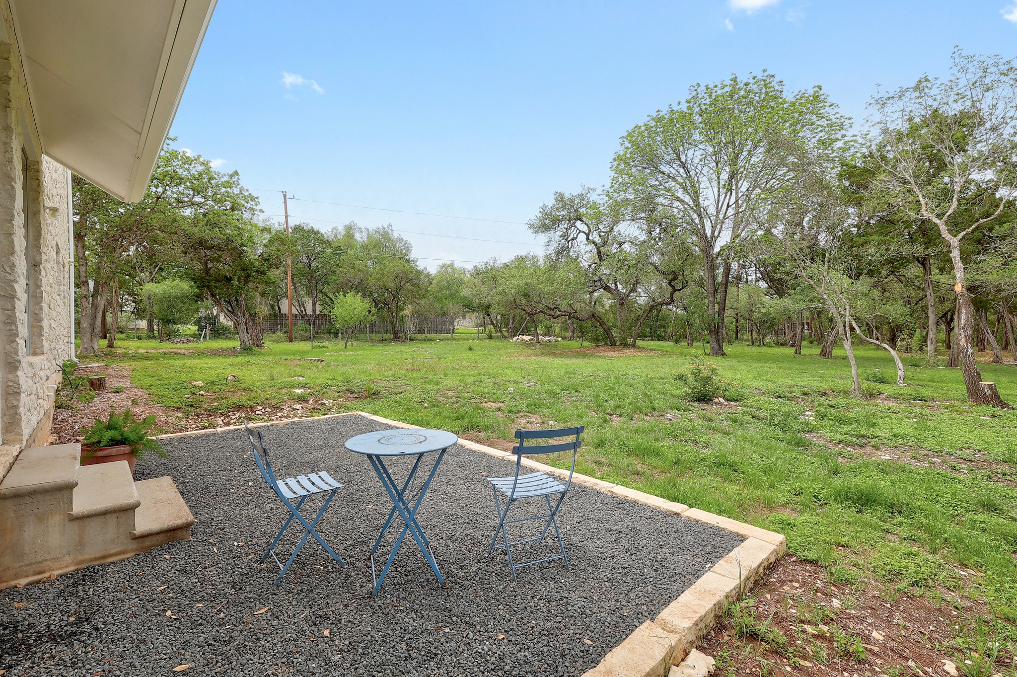 1700 Patterson Road Austin, TX 78733 - Photo 25 of 36 Back Patio off of the Great Room leads to the level back yard