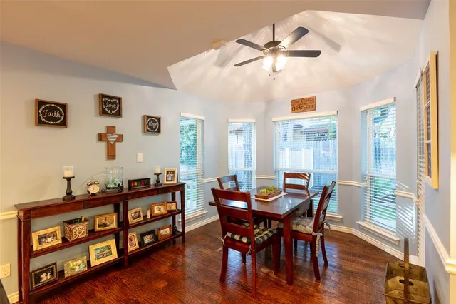 a spacious bathroom with a double vanity sink and a mirror