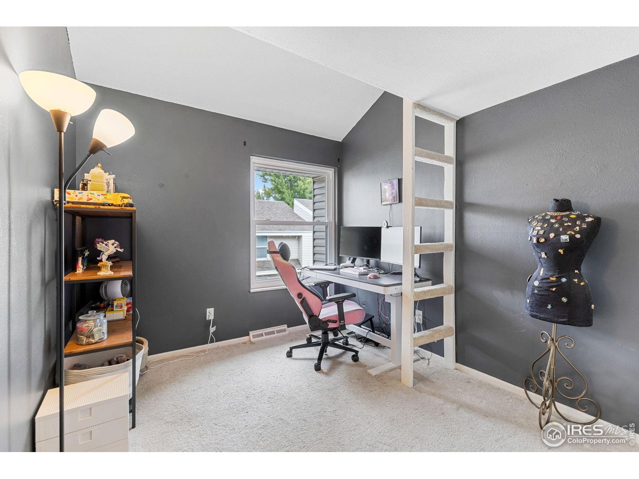 4216 East Maplewood Way Centennial, CO 80121 - Photo 30 of 46 a workspace with furniture and window