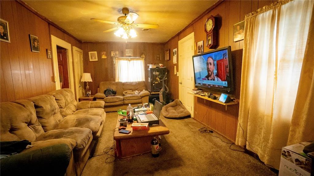 135 Hickory Street Butler, PA 16001 - Photo 13 of 25 a living room with furniture and a window