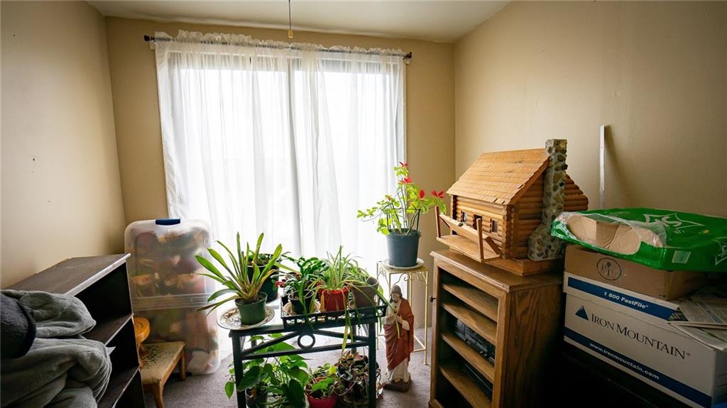 135 Hickory Street Butler, PA 16001 - Photo 17 of 25 a vase of flowers sitting on a table