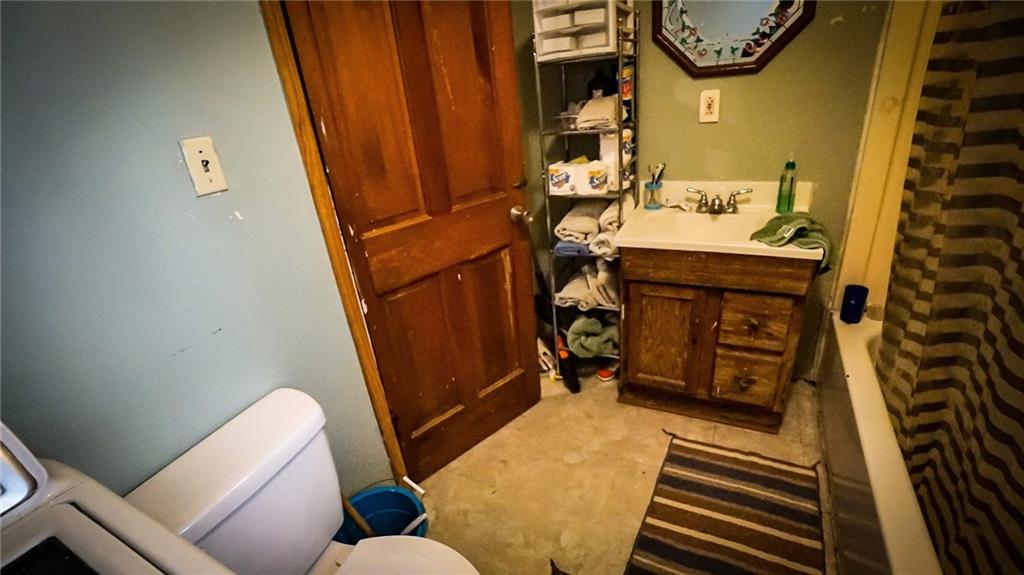 135 Hickory Street Butler, PA 16001 - Photo 18 of 25 a bathroom with a sink and a mirror