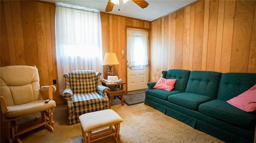 135 Hickory Street Butler, PA 16001 - Photo 22 of 25 a living room with furniture and a large window