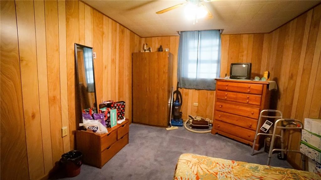 135 Hickory Street Butler, PA 16001 - Photo 23 of 25 a room with furniture and a window