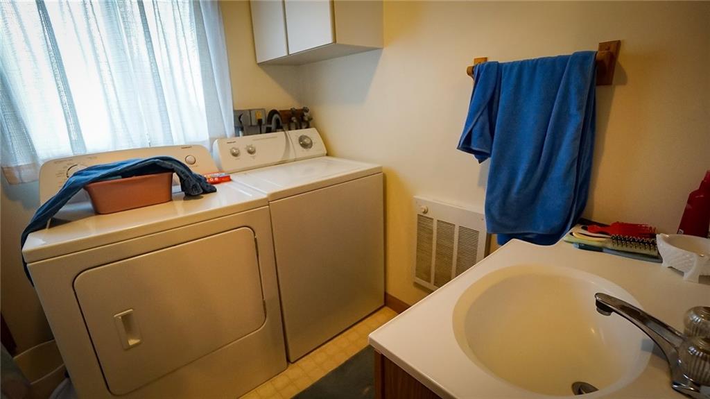 135 Hickory Street Butler, PA 16001 - Photo 24 of 25 a utility room with dryer and washer