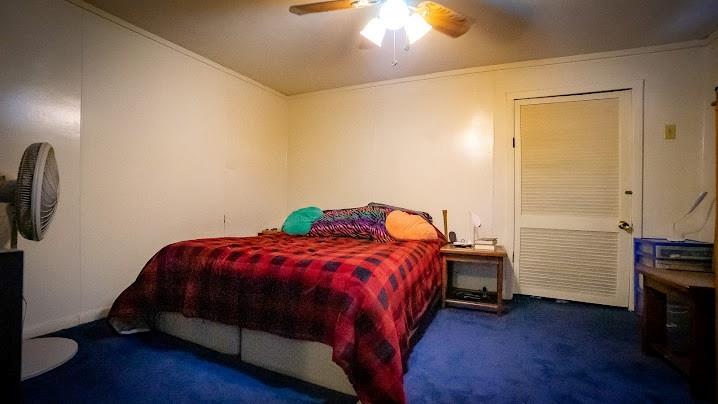 135 Hickory Street Butler, PA 16001 - Photo 4 of 25 a bedroom with a bed and wooden floor