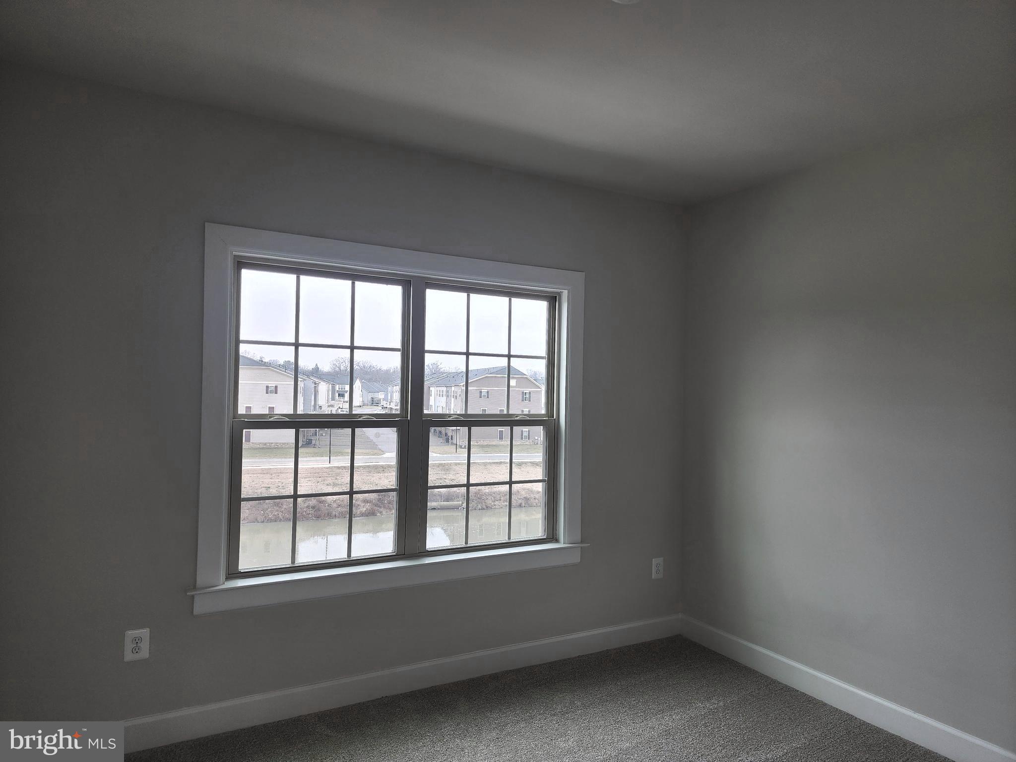2111 Collington Place Laurel, MD 20708 - Photo 11 of 25 an empty room with a window