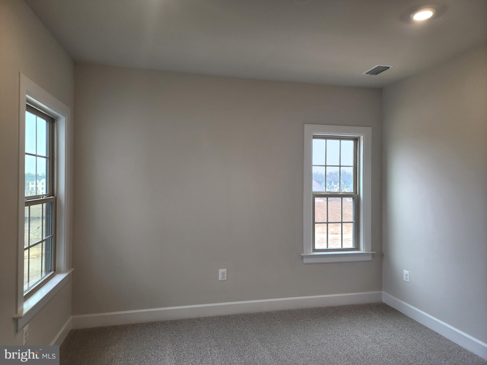 2111 Collington Place Laurel, MD 20708 - Photo 12 of 25 an empty room with windows and windows