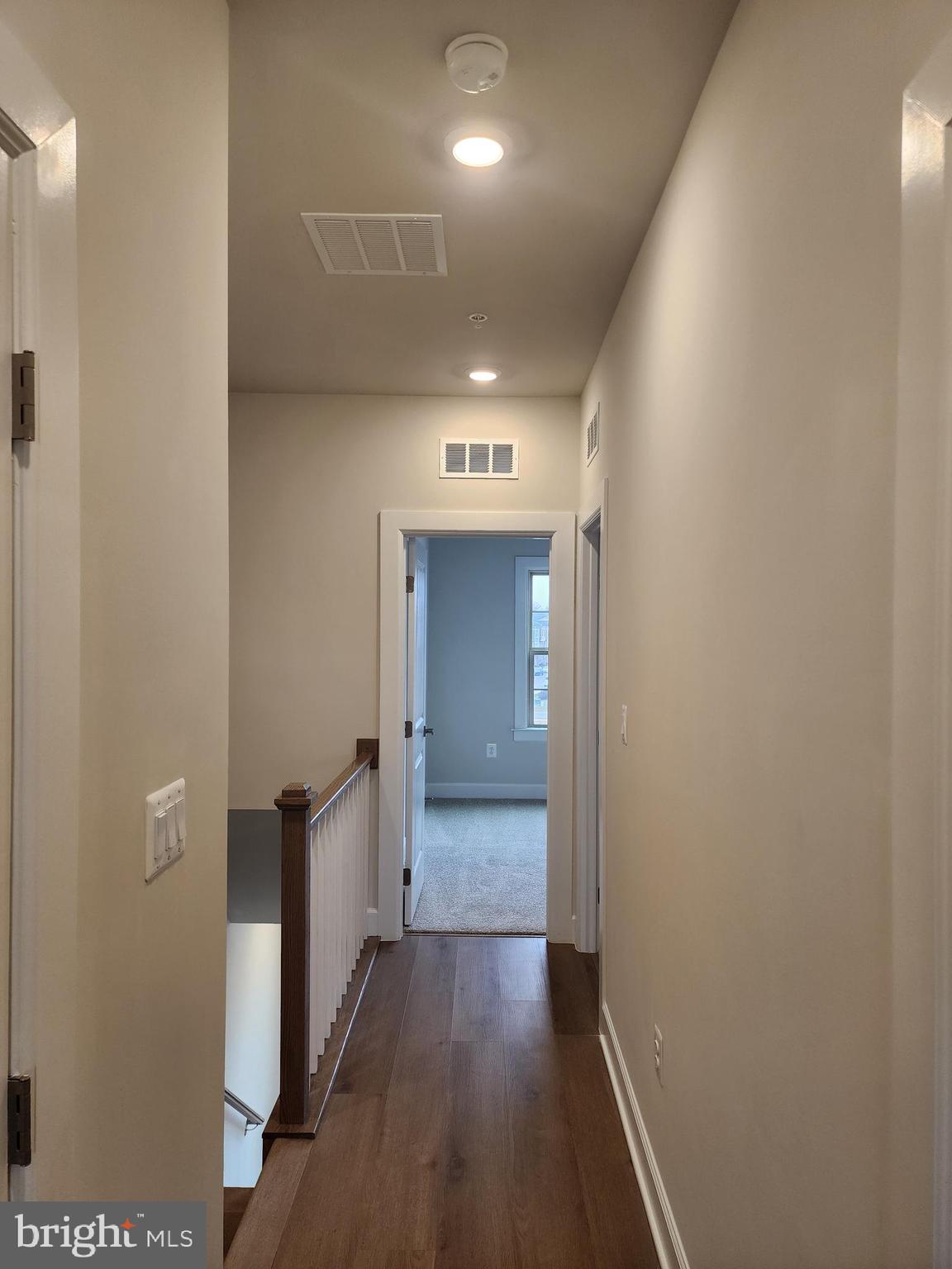 2111 Collington Place Laurel, MD 20708 - Photo 18 of 25 a view of a hallway with wooden floor