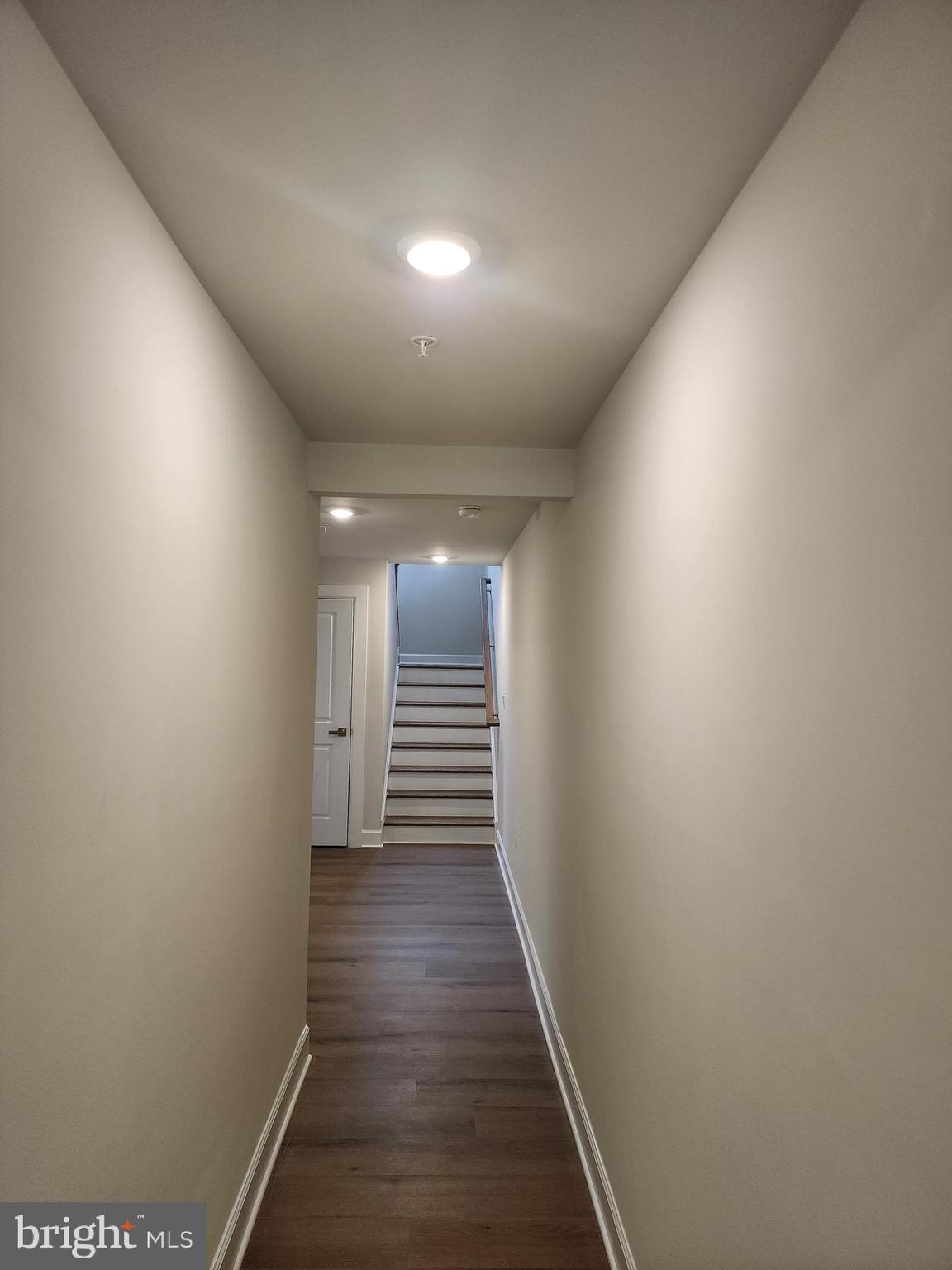 2111 Collington Place Laurel, MD 20708 - Photo 4 of 25 a view of hallway with wooden floor