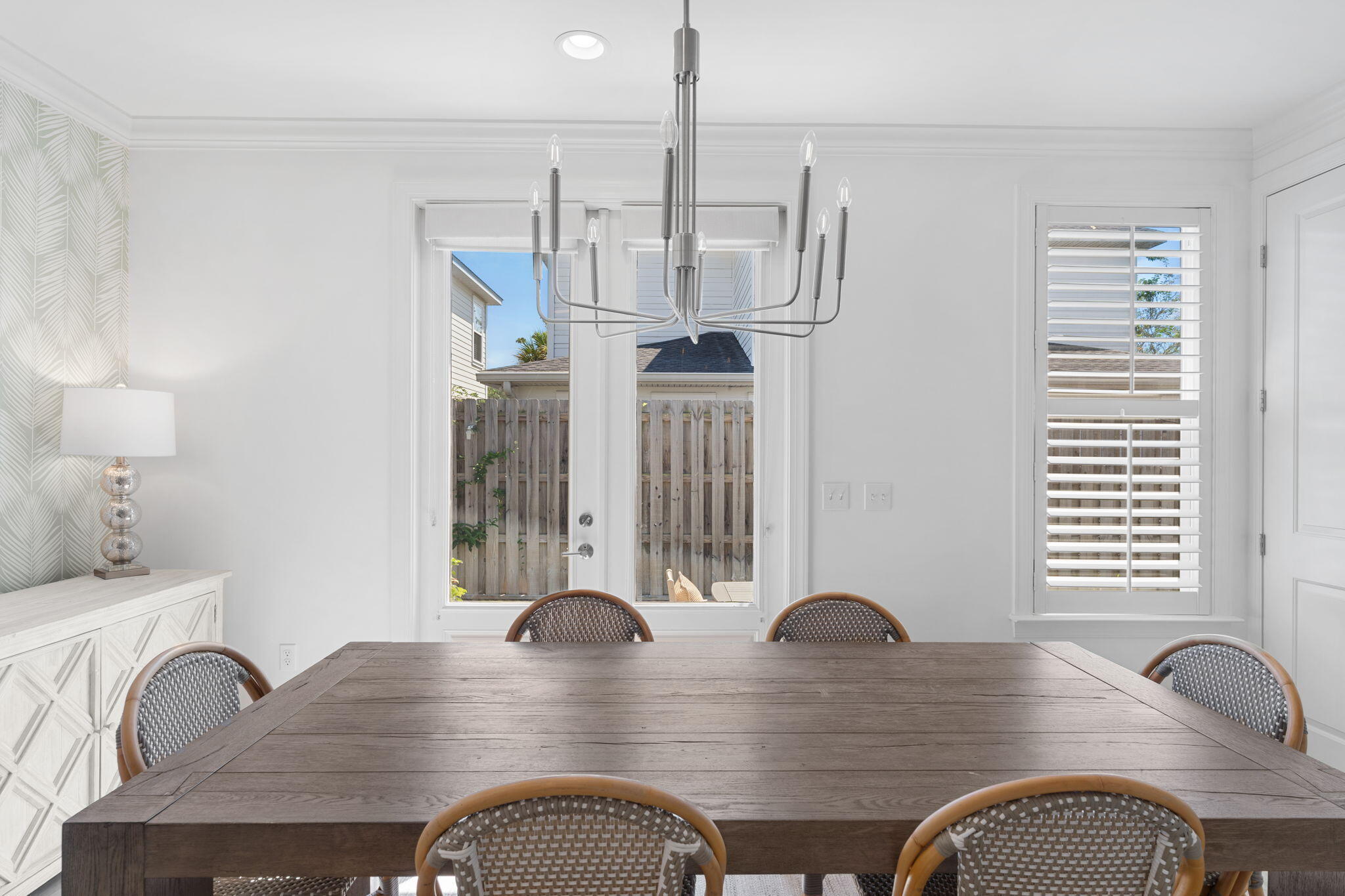 74 Chapman Street Santa Rosa Beach, FL 32459 - Photo 14 of 38 a view of a dining room with furniture and window