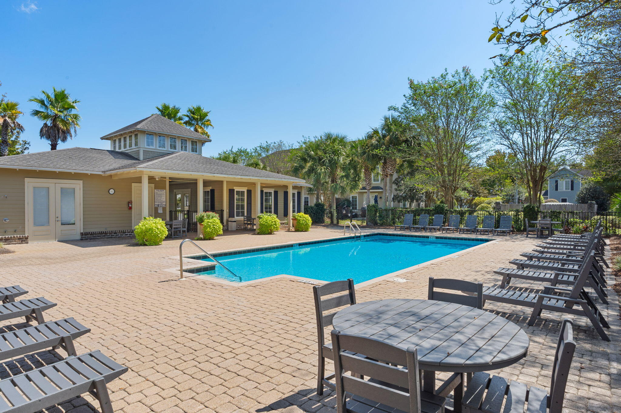 74 Chapman Street Santa Rosa Beach, FL 32459 - Photo 32 of 38 a view of a house with swimming pool and sitting area