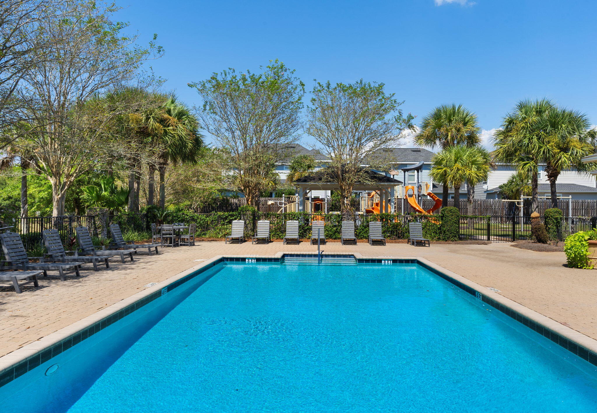 74 Chapman Street Santa Rosa Beach, FL 32459 - Photo 33 of 38 a view of a swimming pool with chairs