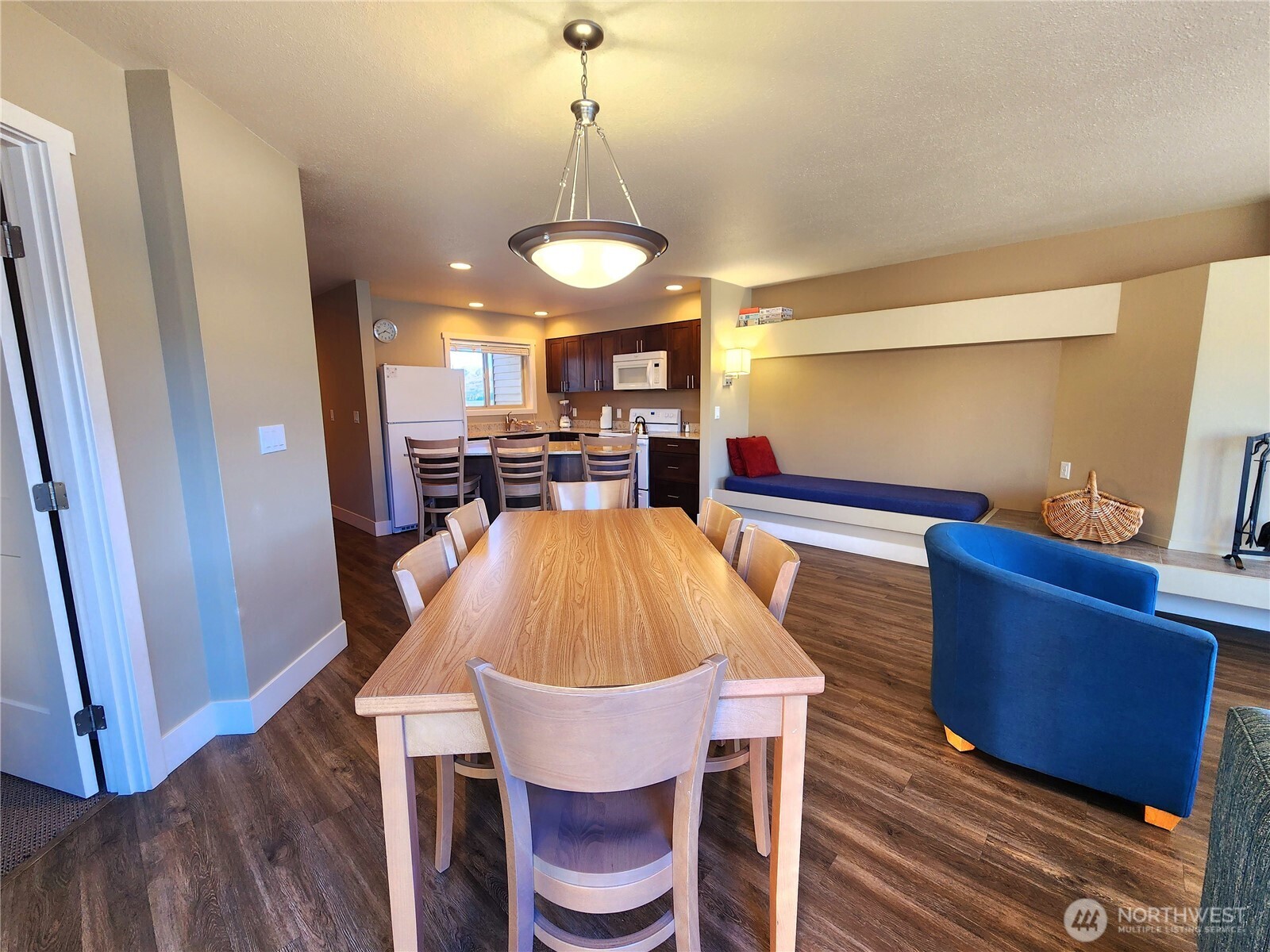 1 Lakeside 717-i Manson, WA 98831 - Photo 13 of 40 a view of a dining room with furniture and wooden floor
