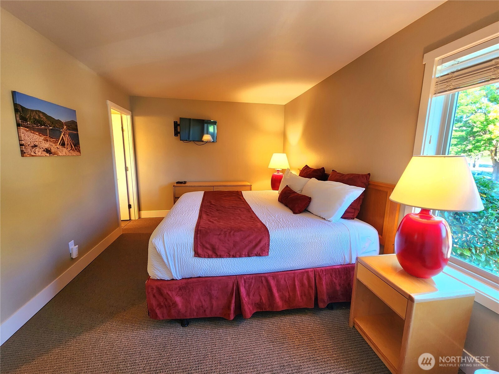 1 Lakeside 717-i Manson, WA 98831 - Photo 16 of 40 a bedroom with a bed and window