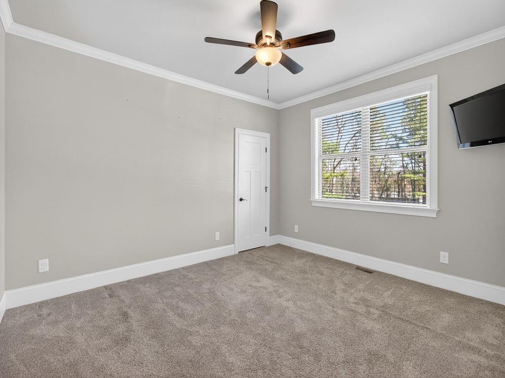 436 Thunder Road Buford, GA 30518 - Photo 25 of 62 a view of an empty room with a window