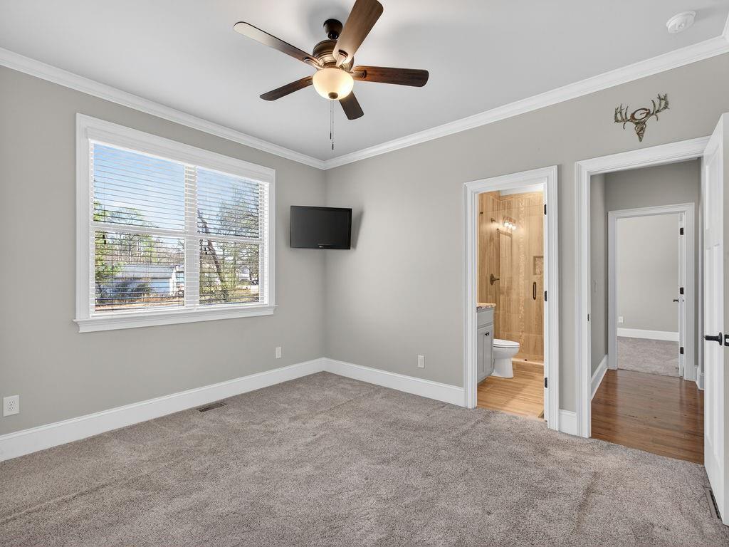 436 Thunder Road Buford, GA 30518 - Photo 26 of 62 wooden floor in an empty room with a window