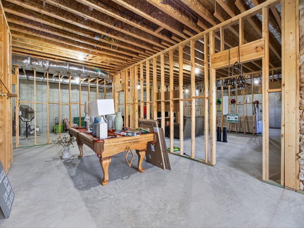 436 Thunder Road Buford, GA 30518 - Photo 41 of 62 a view of a room with gym equipment