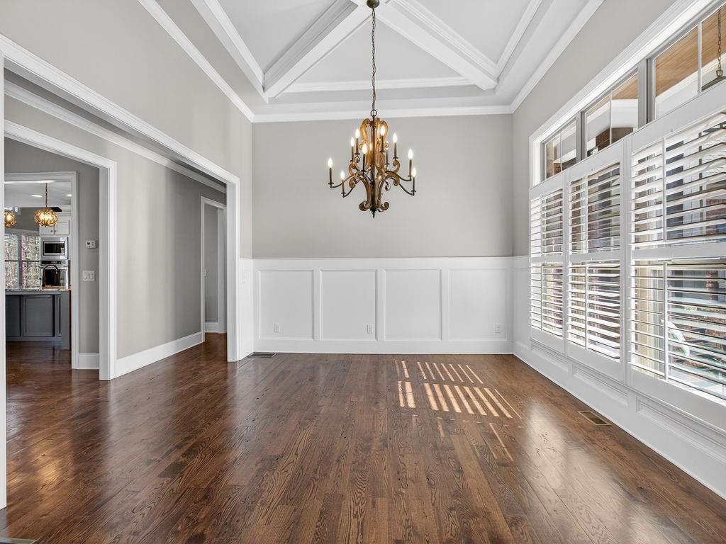 436 Thunder Road Buford, GA 30518 - Photo 5 of 62 a view of a livingroom with wooden floor