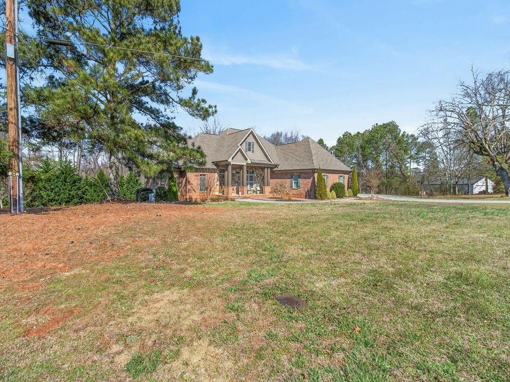 436 Thunder Road Buford, GA 30518 - Photo 51 of 62 a house view with a garden space