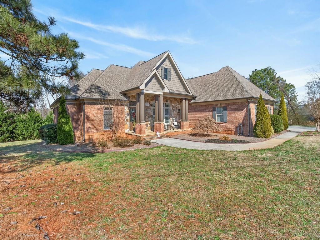 436 Thunder Road Buford, GA 30518 - Photo 52 of 62 a front view of a house with garden
