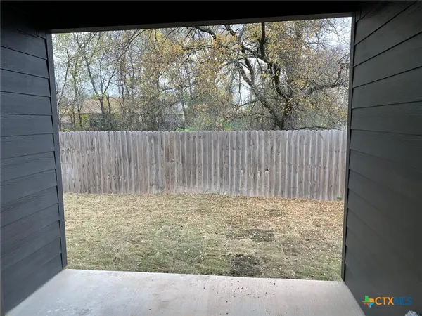 a view of wooden fence