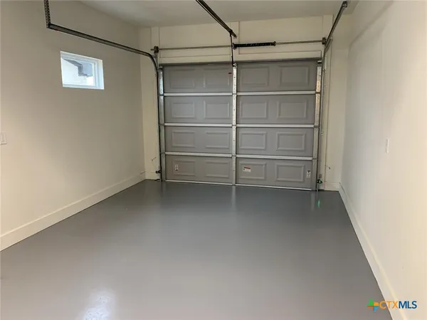 a view of a room with an empty space