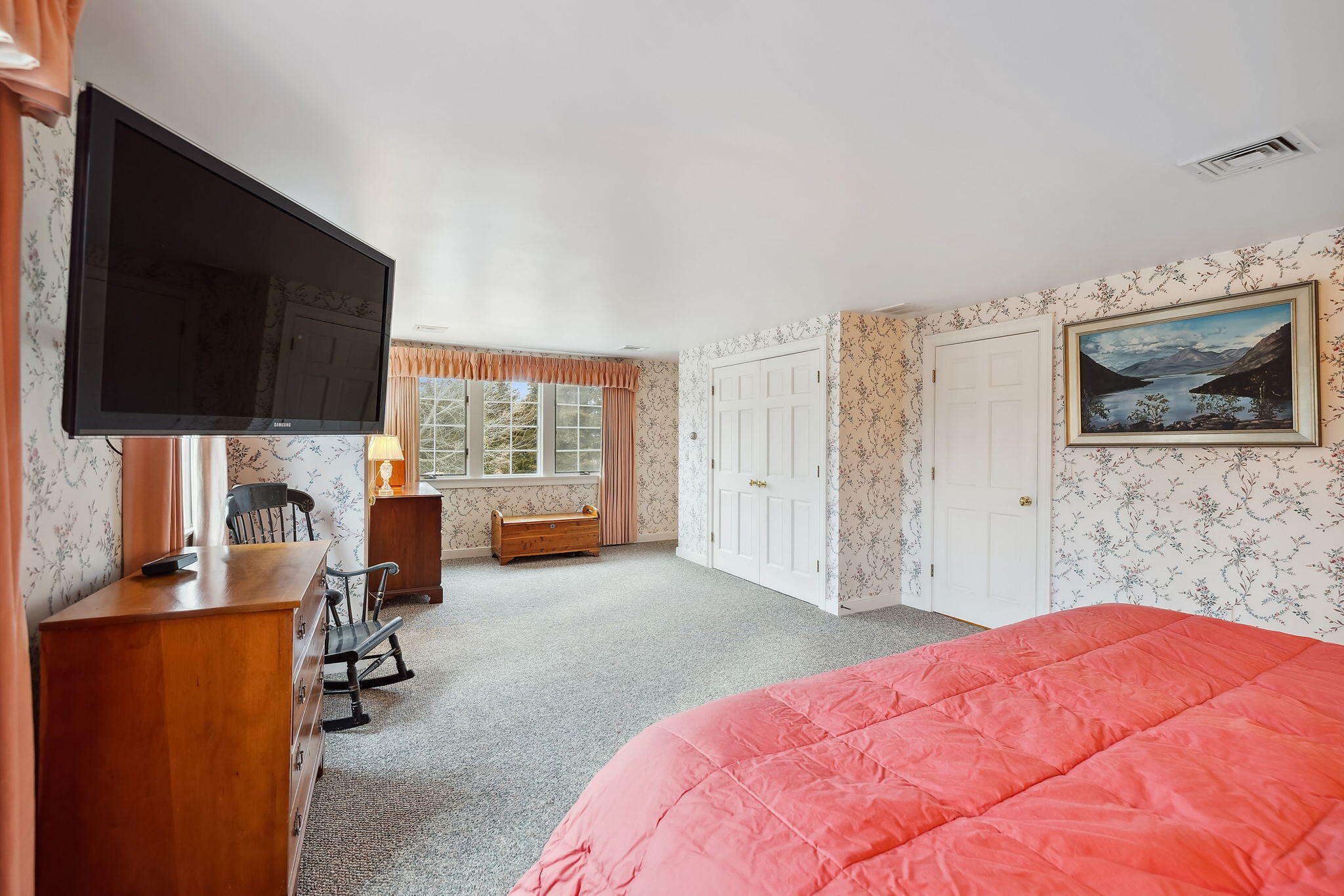 46 Freeman Lane Orleans, MA 02653 - Photo 35 of 74 a bedroom with a bed and a flat screen tv