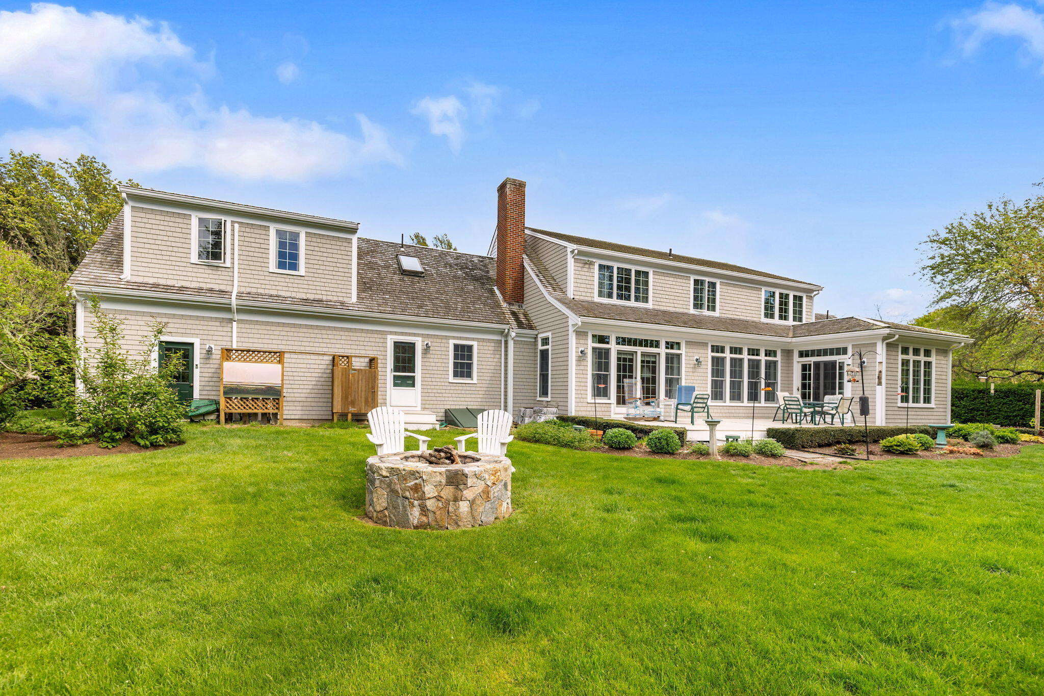 46 Freeman Lane Orleans, MA 02653 - Photo 53 of 74 Outdoor shower and firepit