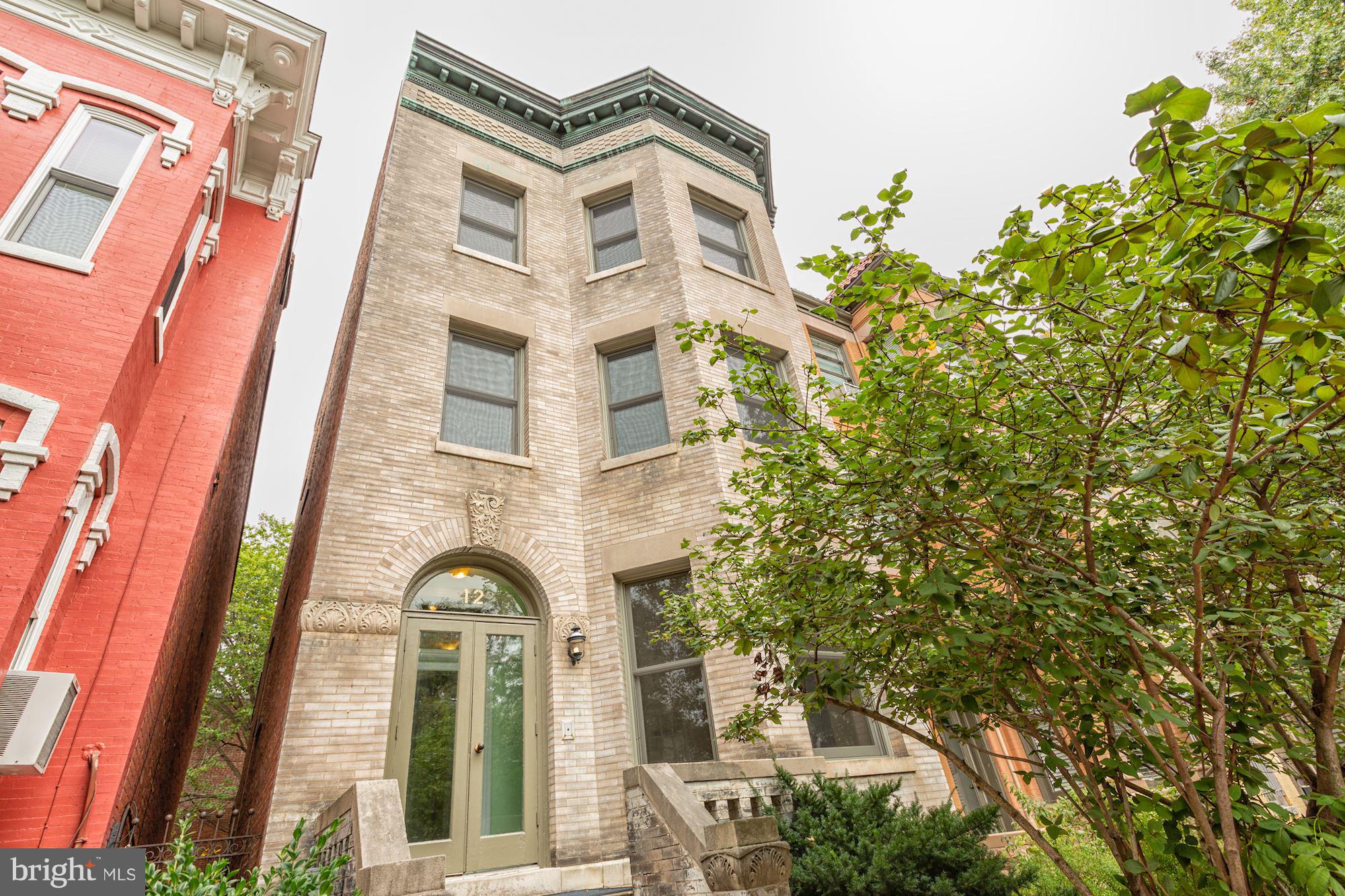 a front view of a multi story residential apartment building