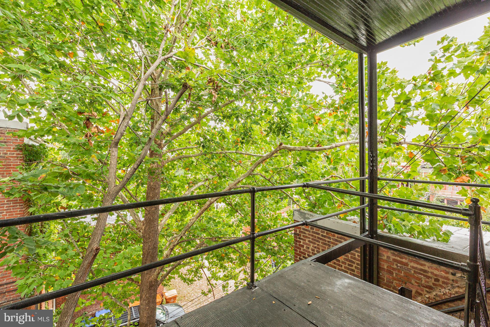12 3rd Street Southeast Washington, DC 20003 - Photo 13 of 22 a view of a balcony with wooden floor