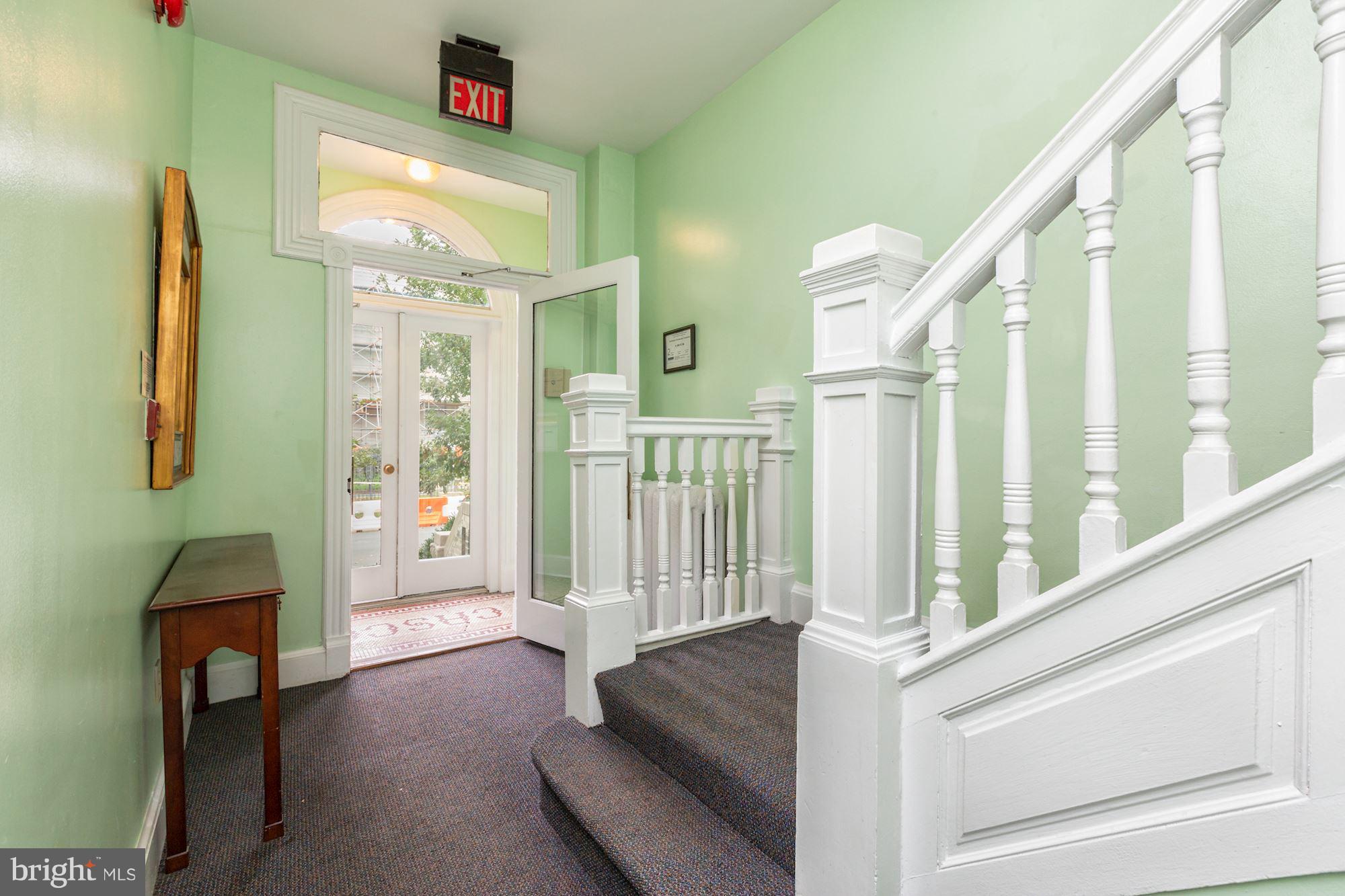 12 3rd Street Southeast Washington, DC 20003 - Photo 8 of 22 a living room with furniture and a fireplace